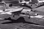F-8H_Crusader_VF-202_landing_on_JFK_1971.jpg