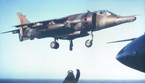 Plane_HarrierGR3_over_carrier_1982.jpg