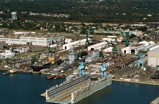 1024px-Newport_News_Shipyard,_aerial_view,_Oct_1994.jpeg